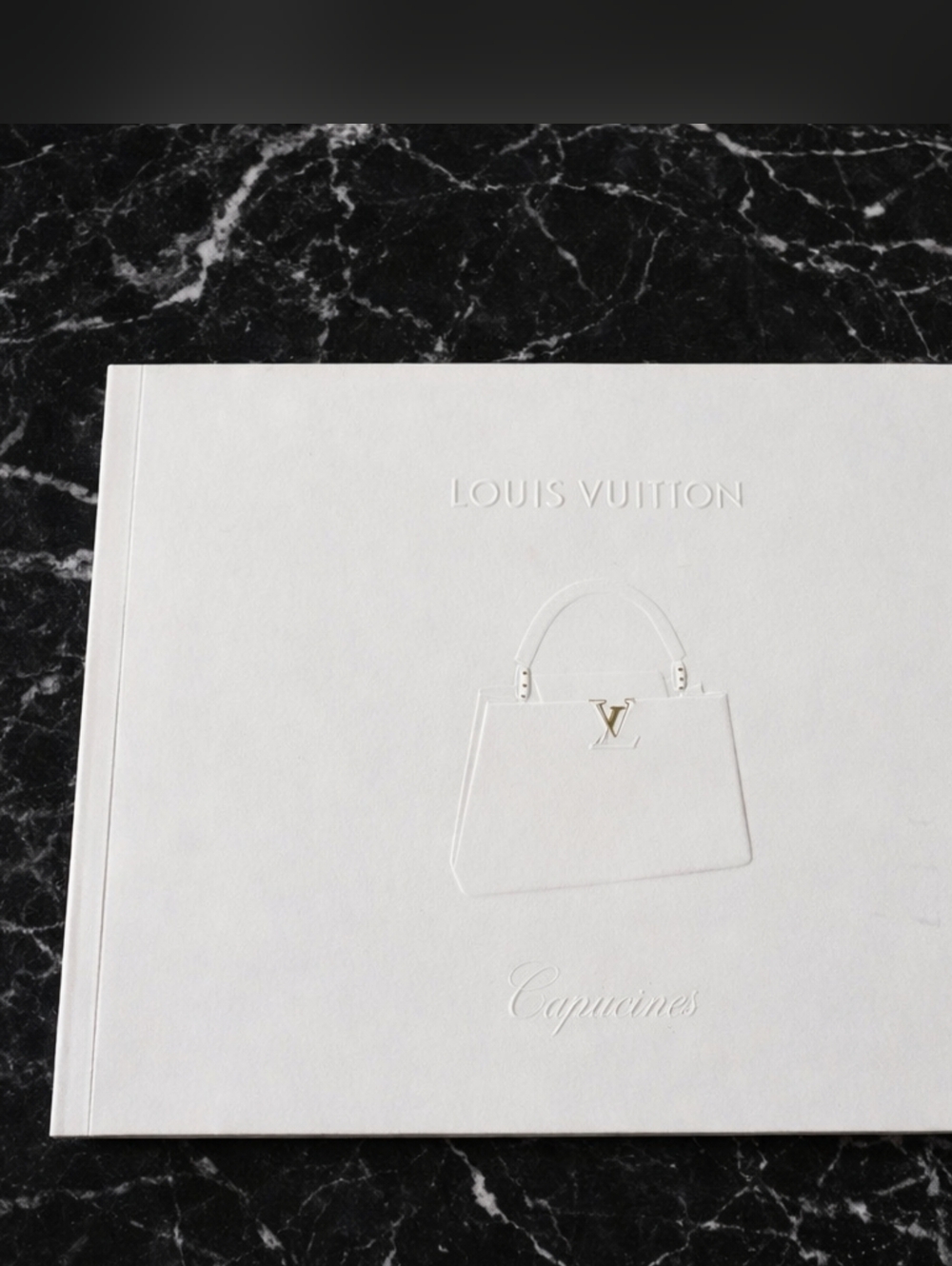 Louis Vuitton History of Capucines Booklet